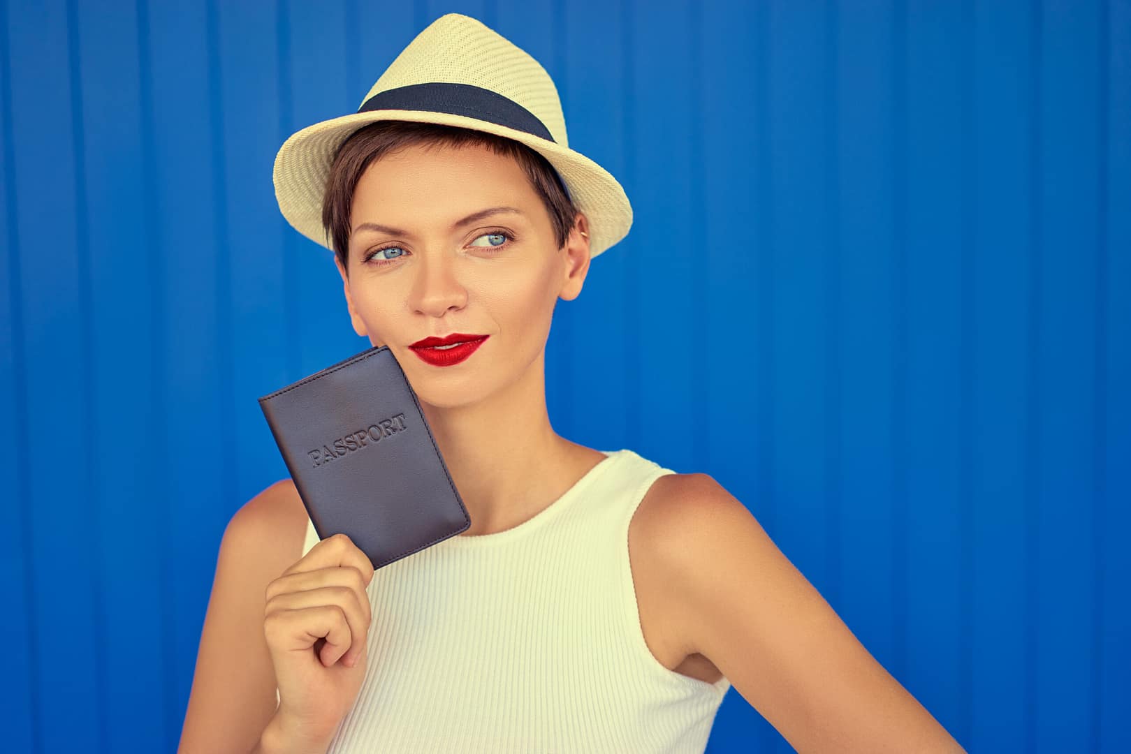Vacation,Choice.travel,Concept.,Portrait,Of,Thoughtful,Pretty,Young,Woman,Holding Hotel technology