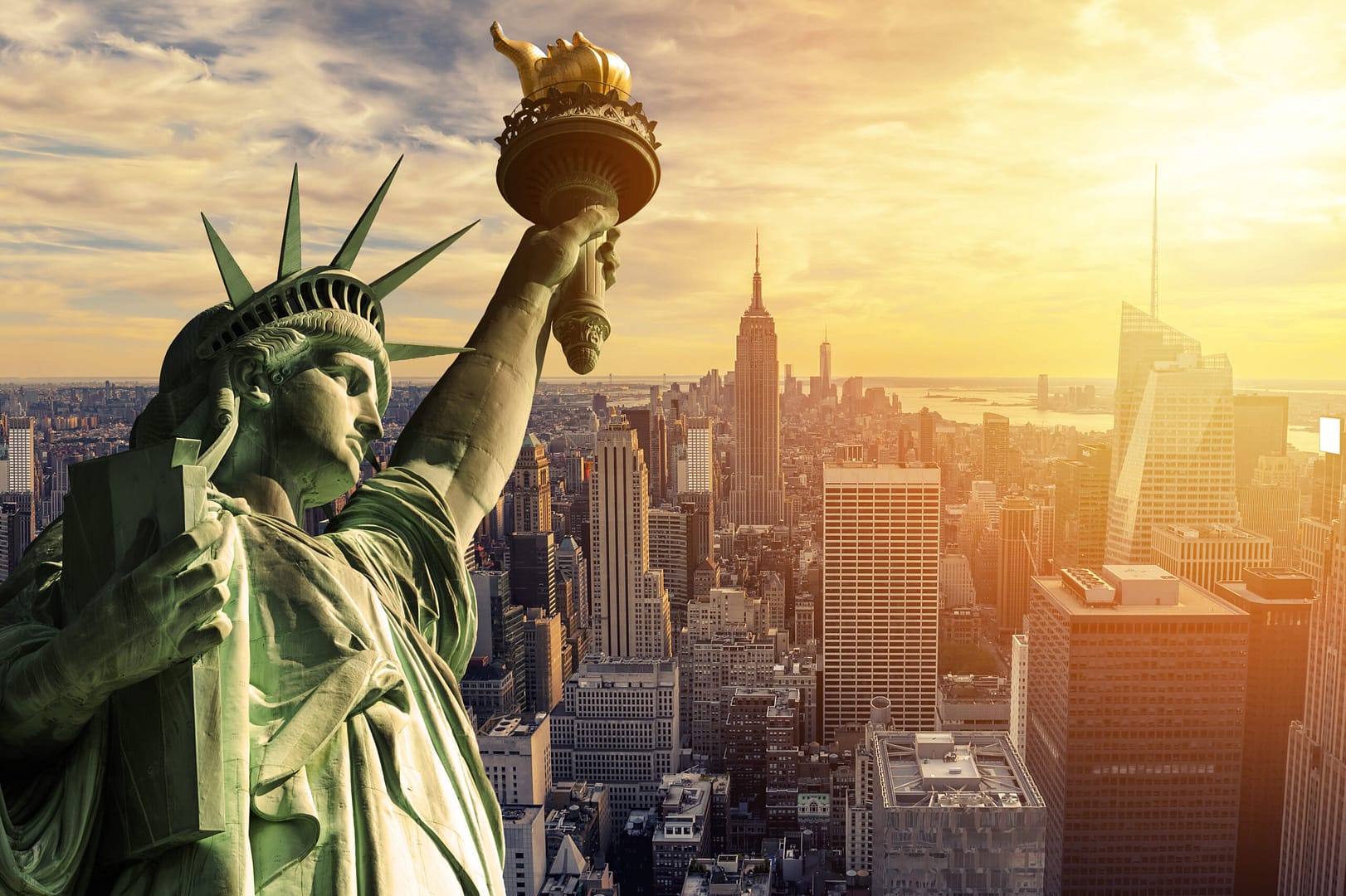 The,Statue,Of,Liberty,And,New,York,City,Skyline,At New York Hotels