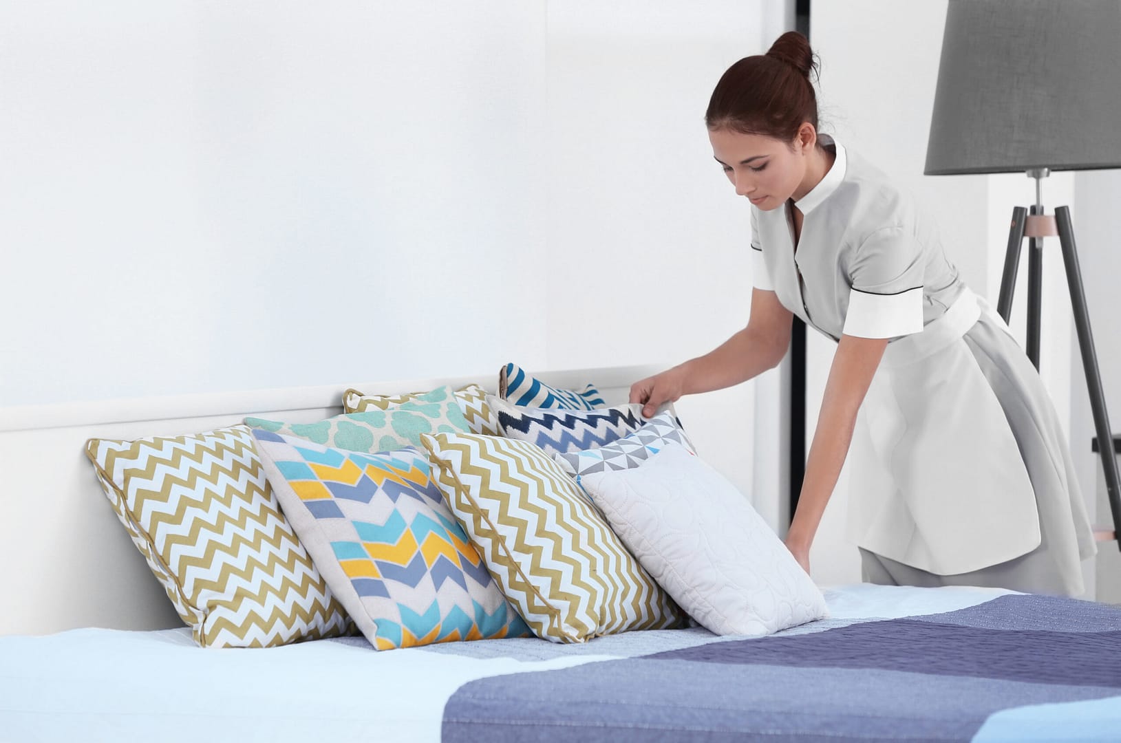 Female,Chambermaid,Making,Bed,In,Hotel,Room hotel panic buttons