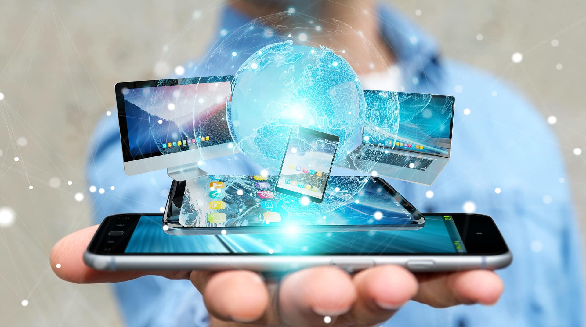 Businessman,Connecting,Tech,Devices,And,Icons,Applications,With,Each,Other hotel technology