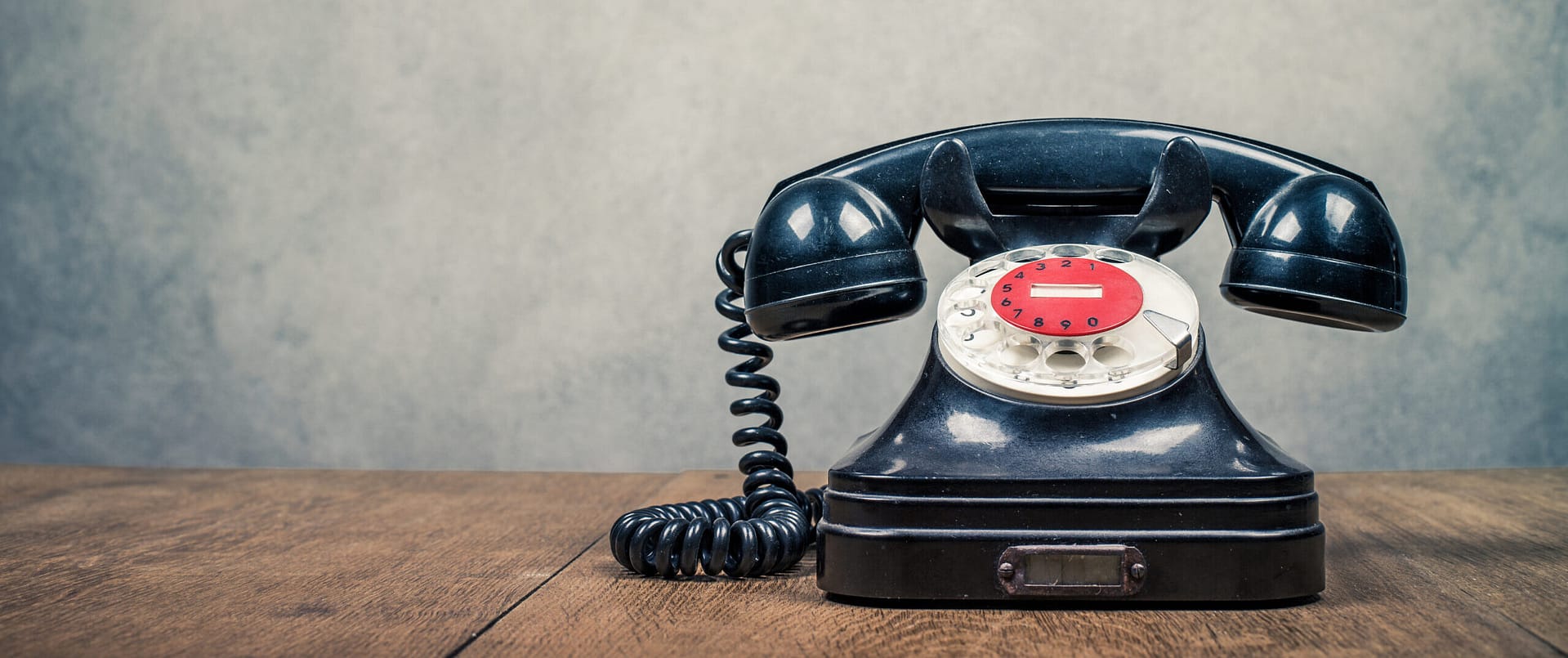 Retro,Old,Black,Rotary,Telephone,On,Table,Front,Textured,Concrete Ray Baum's Act Phone